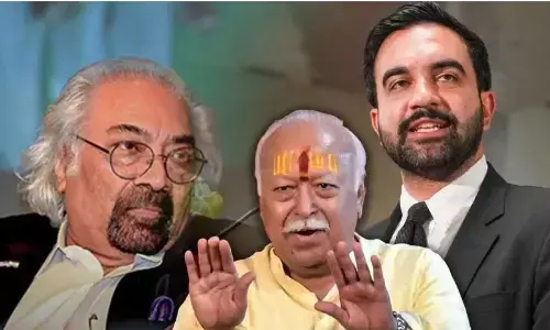 RSS New York event: मोहन भागवत के न्यूयॉर्क इवेंट पर छिड़ी सियासी बहस, इंडियन ओवरसीज कांग्रेस के सैम पित्रोदा ने ममदानी का समर्थन क्यों किया?